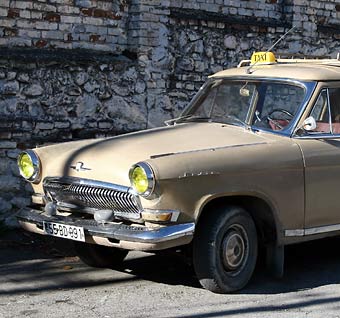 GAZ 21 yellow taxi